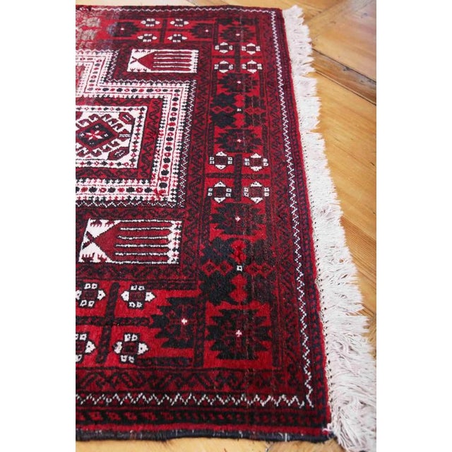 Hand-knotted Afghan rug. Central field with bute motifs. Wool pile on cotton warp. Weaving density around 250,000 knots...