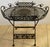 Antique French Style Folding Wrought Iron Garden Table with Grapevine Motif, Oval Pierced Top, Circa 1900 A highly...