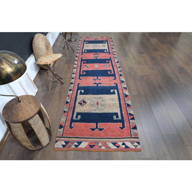 Vintage Turkish Hand-Knotted vintage rug is a semi- vintage runner rug.'70s Eastern region of Turkey's unique rug is...