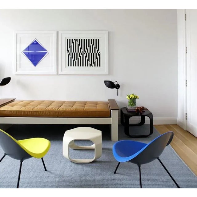 Pair of Serge Mouille 'Antony' Wall Lamps in Black. Originally designed in 1953, this iconic lamp is still made by Edition...