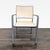 These chairs features a sturdy metal frame with sleek armrests and a comfortable beige mesh seats and backs. Their modern...