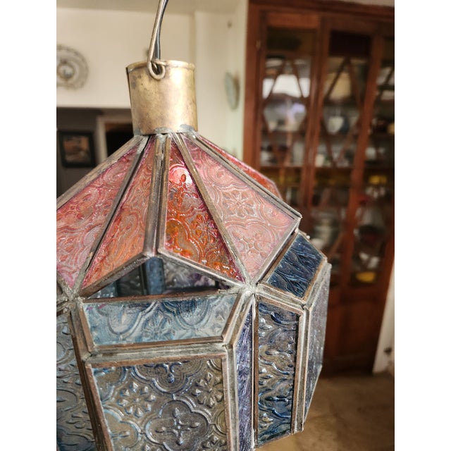 Art Deco pendant light Brass and colored cathedral glass Highly decorative Excellent condition Width 25 cm Maximum height...