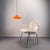 Elegant orange Tulip pendant lamp from the Fürth-based lighting manufacturer Doria. Hand-blown glass shade with polished...