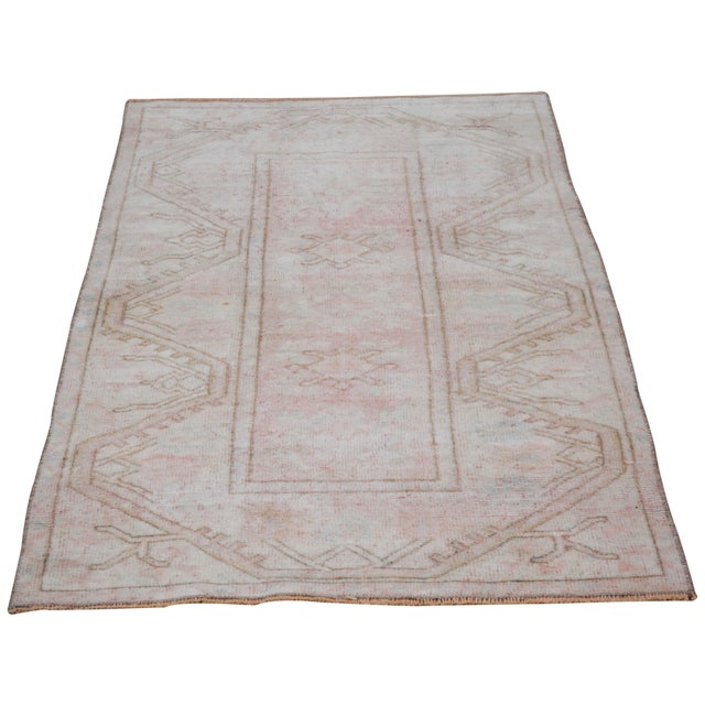 Hand-knotted with care using traditional rug-making techniques, this wool rug blends timeless craftsmanship with a modern...