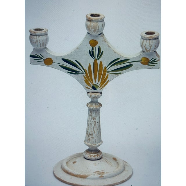 A small collection of Swedish wreaths carved from wood in classic colors. All are handcrafted and painted. The pieces date...