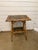 This 19th Century English Bamboo Side table features a delightful variety of fish decoupaged onto the top and lower shelf....