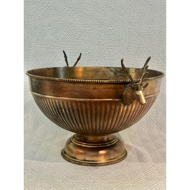 Bring a woodland/Ralph Lauren touch to your entertaining with this handsome antique-finish solid brass pedestal bowl...
