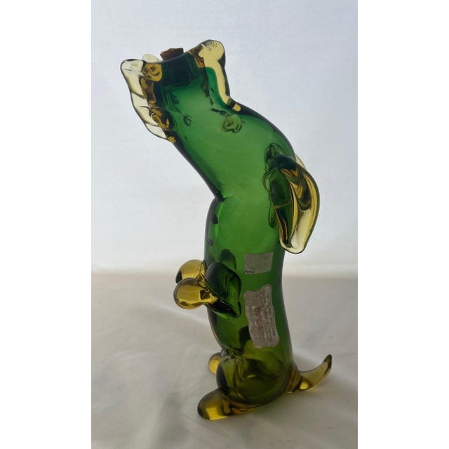 Unique early 20th century hand blown glass decanter depicting a dog. The original cork remains, but the alcohol is no...