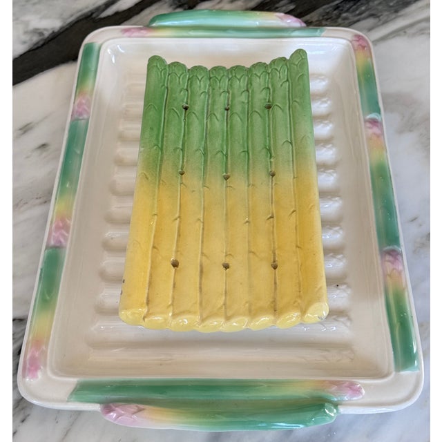 Presenting a decorative and beautifully functional way of heralding the king of all spring vegetables! Here is a majolica...
