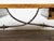 An Italian Baroque style walnut desk table from the late 19th century, with inlaid top, two drawers, lyre-shaped legs and...