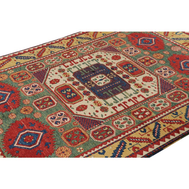 Made with hand-knotted wool in Turkey circa 1950-1950, this 5x8 vintage tribal rug is an exciting new curation from Rug &...