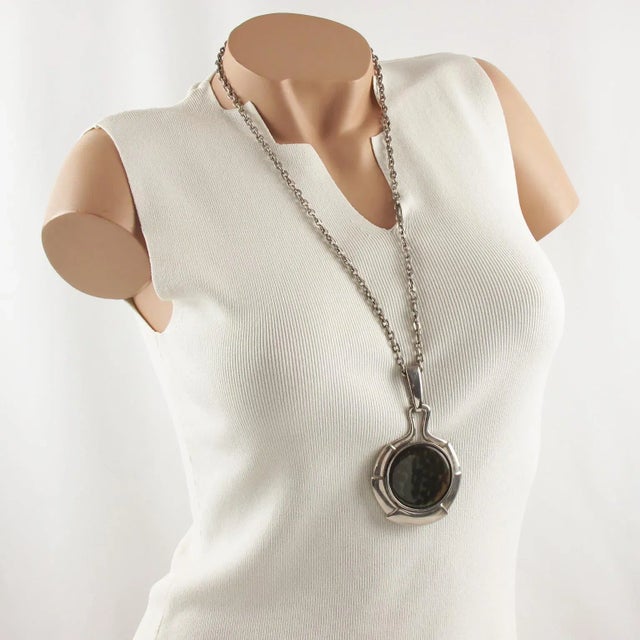 This is part of Chairish’s Costume Jewelry assortment. Lovely Space Age Mid-Century modernist pendant necklace. Heavy...