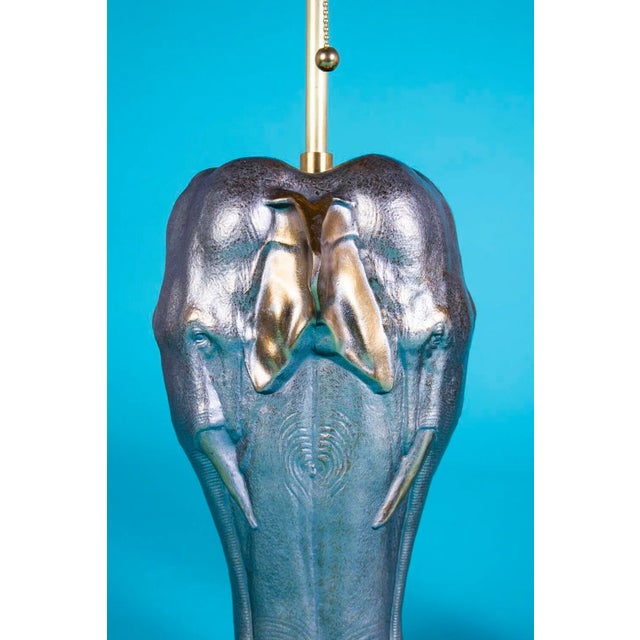 Amazing vintage pair of Stiffel elephant tri-face lamps. Bodies have a pronounced silver metallic sheen with brass...