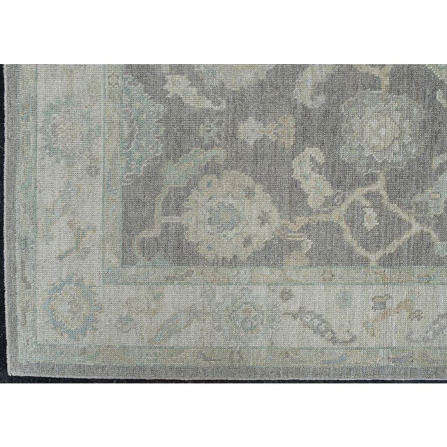 Turkish Oushak Rug Gray, Sage & Ivory Handwoven Rug 5'3" X 6'8" This handwoven wool rug is a beautifully crafted Turkish...