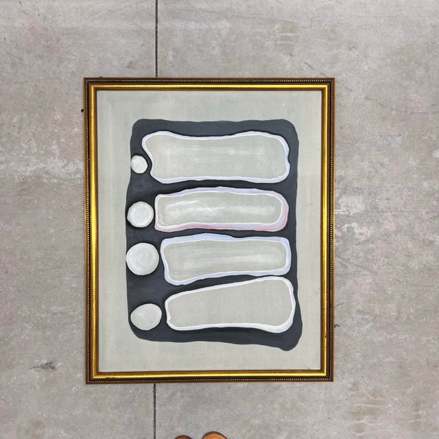 Wonderful light sage green based abstract geometric oil painting by C. Andrews. The piece is framed in a gold gilt frame...