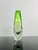 An exceptional signed Moser Karlsbad art glass vase crafted from green uranium glass with a clear crystal base. The...
