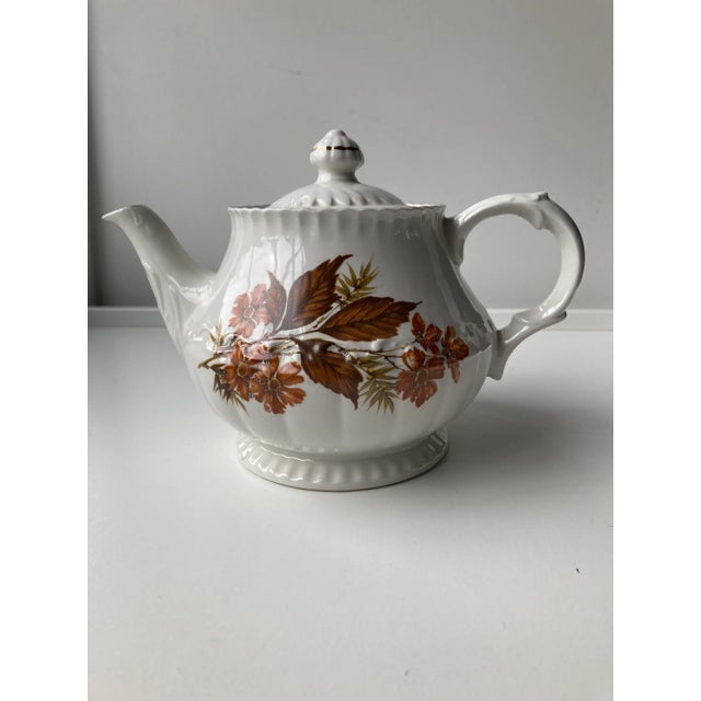 Vintage Brown Floral and leaf design lidded tea pot 9"L X 5.5"W X 6.5"H With lid, Makers mark reads "Wood & Sons Alpine...