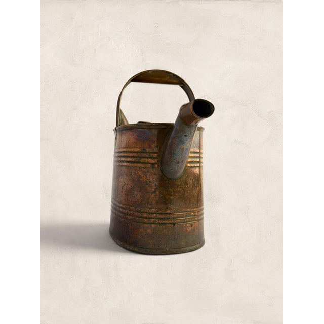 Antique English Copper Watering Can A beautifully aged English copper watering can dating to the early 20th century,...