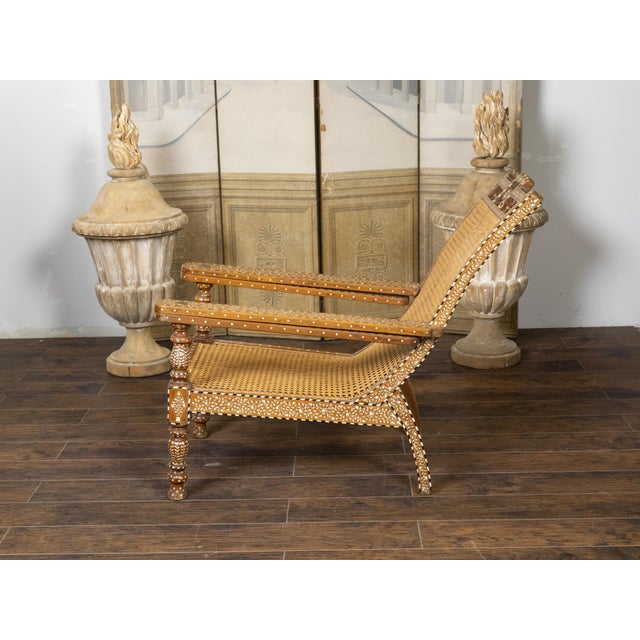 Early 20th Century Anglo-Indian Inlaid Plantation Chair with Scrolling Foliage and Extending Arms For Sale - Image 9 of 12