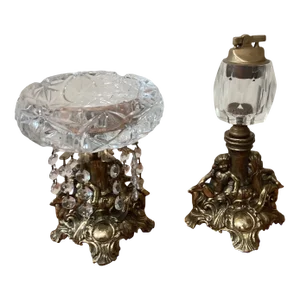 Mid 20th Century Hollywood Regency Loevsky & Loevsky Crystal Ashtray and Lighter Smoking Set With Brass Cherub Base- 2 Pieces
