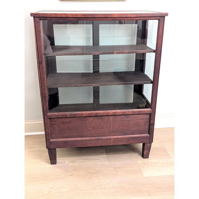 This exceptional general store showcase dates to the turn of the 20th century (circa 1890–1920). Masterfully crafted from...