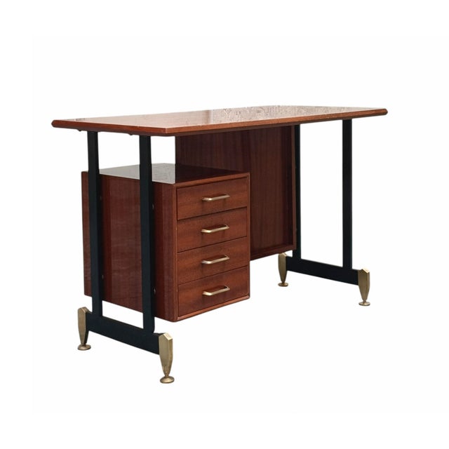 Antonio Ferretti Teak Writing Desk with Brass Handles and Feet, Italy, 1960s. The writing desk is distinguished by its...