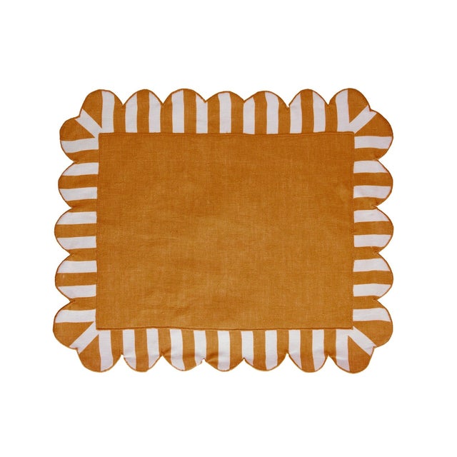Even the most casual of dinners will feel fun and playful when framed by our candy-striped scalloped placemats. Try mixing...