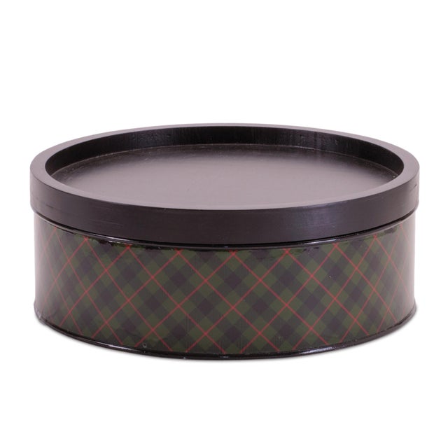 Bring classic lodge-inspired style to your home with this plaid iron canister set, featuring rich red and green tartan...