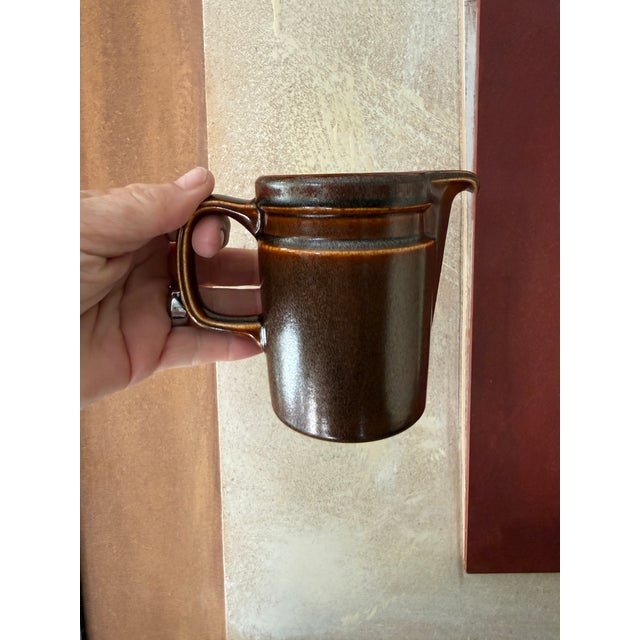 This is a vintage Wedgwood stoneware creamer in the classic Sterling pattern, produced in England during the 1970s....