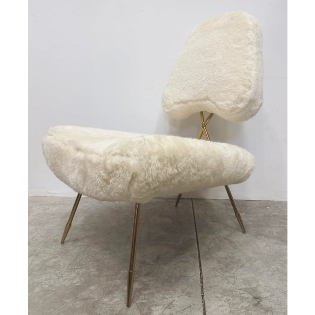 Jonathan Adler Maxime Shearling Slipper Lounge Chair Offered for sale is a Jonathan Adler Maxime Shearling Lounge Chair...