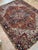 Antique Persian Heriz rug, hand knotted in Iran from 100% wool. Measuring 8’2” x 11’8”, the rug features a bold...