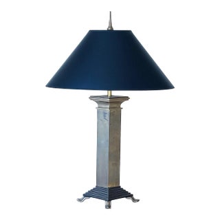 Vintage Neoclassical Rhombus Shaped Brass Footed Column Lamp With Black and Gold Shade, by Chapman For Sale