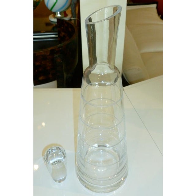 This chic modernist, heavy clear glass decanter with it's circular raised design is perfect for any bar. The wonderful...