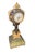 Decorative 19th century French mantel clock featuring a richly ornamented champlevé enamel clock case raised above a...