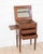 Made in France in the nineteenth century, this Louis XVI style side or bedside table is constructed in wood veneer. The...
