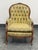 Design Plus Gallery presents a Vintage French Louis XV Style Tufted Bergère Armchair. This ornate armchair showcases a...