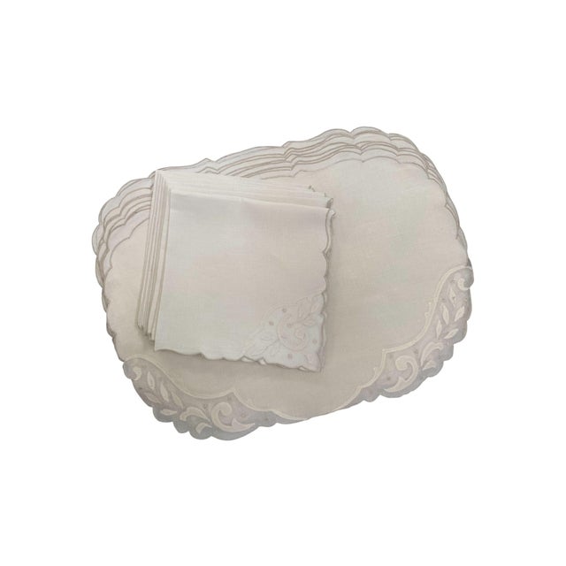 A set of 8 creamy off white scalloped edge oval linen Madeira placemats and 8 napkins with hand appliqué and hand...
