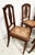 Set of six Art Deco chairs in solid walnut Cane seats Sculpted central spindle backrests Stable and sturdy chairs Good...