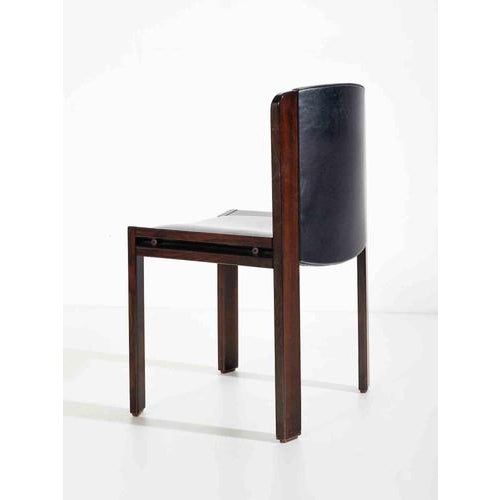 Four chairs created by Joe Colombo in 1966 for Pozzi. Lacquered wood and padded skai. Ref. I Colombo. Joe Colombo...