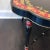 Large Painted Tray Table Ebonized tray table with bamboo x-base and serpentine shaped top with gold and red painted floral...