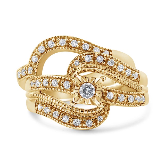 Surprise your beautiful bride with stunning natural diamonds! This 1/3 cttw round diamond engagement ring is an elegant...