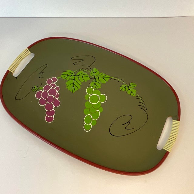 This style of tray was highly popular in the 1950s and 1960s. This is one of the most colorful versions we have come...