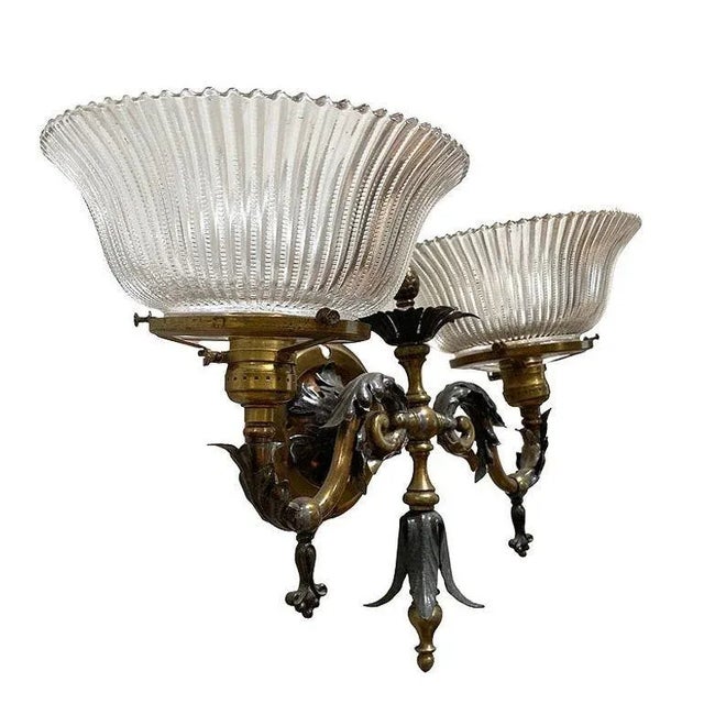 A stunning pair of antique bronze Baroque/Neoclassical dual gas sconces, showcasing intricate craftsmanship with two-tone...