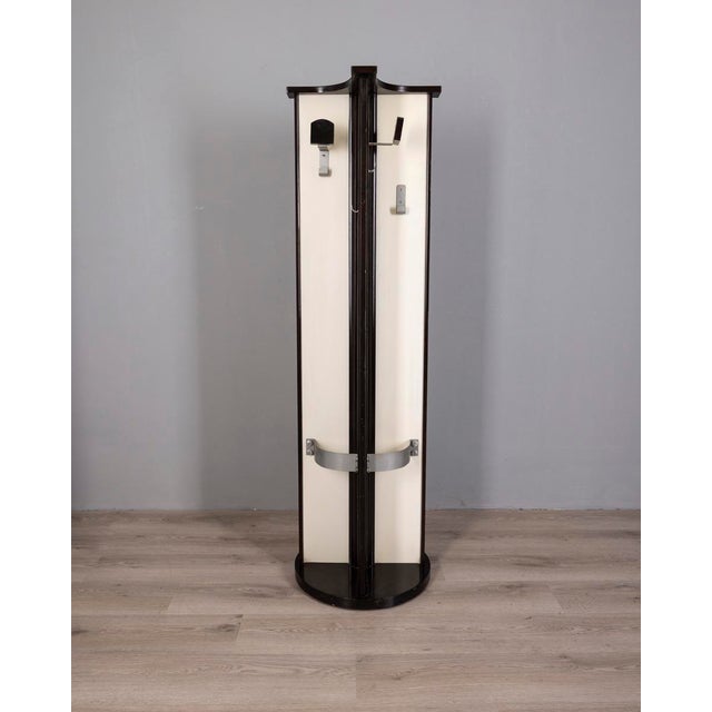 Coat stand / umbrella stand, with white lacquered wooden structure with dark wood inserts, chromed metal hooks, designed...