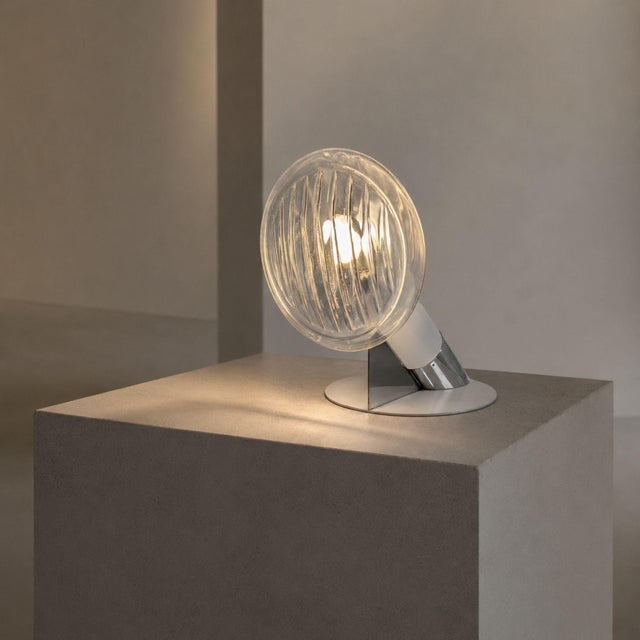Rare Italian table lamp designed by Carlo Nason for Mazzega in the 1970s, from the iconic “Car Optics” series. This...