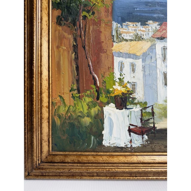 Nicely done contemporary painting of what looks like an idyllic coastal Mediterranean town.