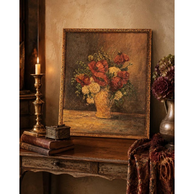 A richly textured early-to-mid 20th century floral still life, painted in oil and presented in an aged gilt decorative...