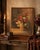 A richly textured early-to-mid 20th century floral still life, painted in oil and presented in an aged gilt decorative...