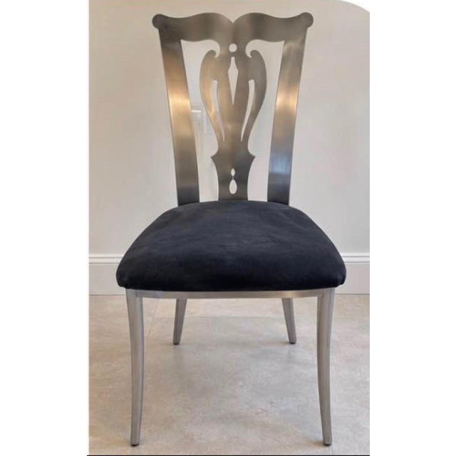 Set of six vintage dining chairs by Design Institute of America (DIA) featuring sculptural open backs, sleek chrome-...
