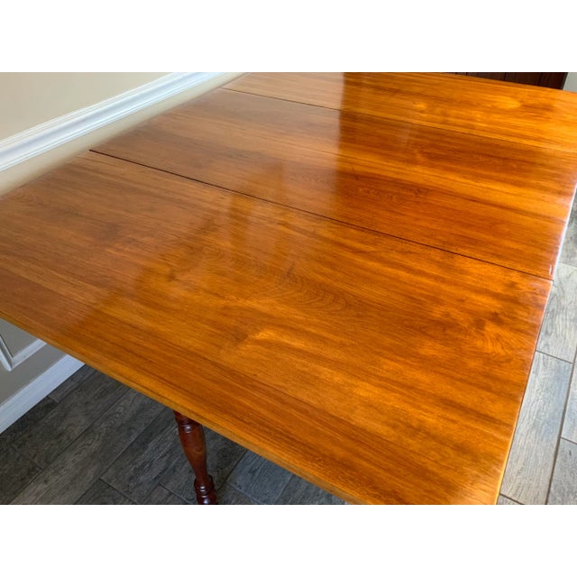 Very nice large Sheraton Cherry drop leaf dining table. This is a beautiful table with large board leafs and great detail...
